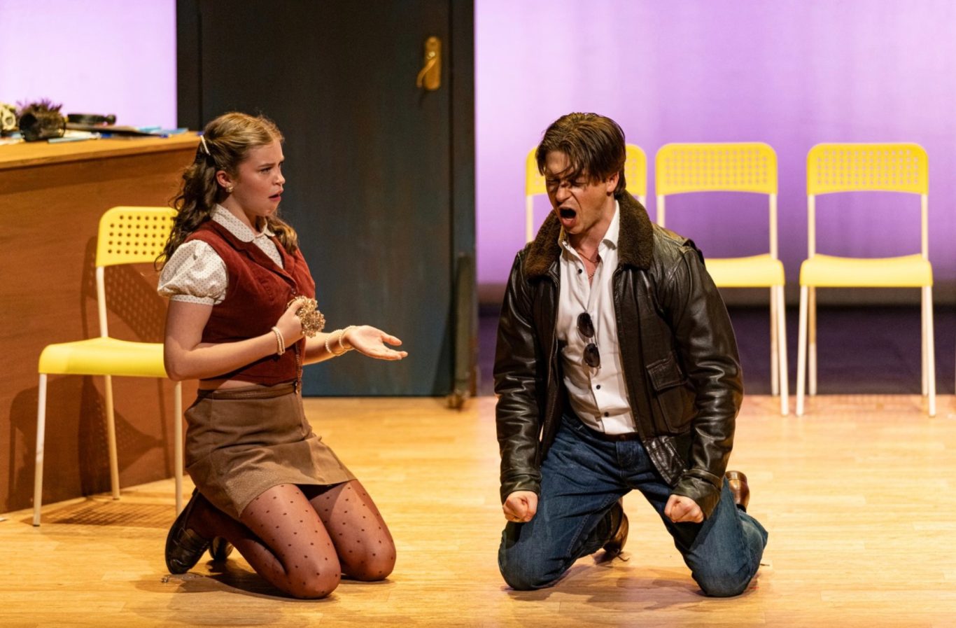 Vespetta, Opera School Scenes Two young people crouch angrily onstage, singing